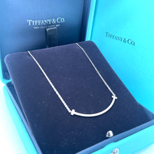 Load image into Gallery viewer, Tiffany &amp; Co. 18ct White Gold T Smile Diamond Pendant 0.10ct 2.37g