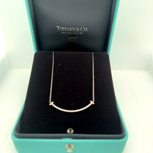 Load image into Gallery viewer, Tiffany &amp; Co. 18ct White Gold T Smile Diamond Pendant 0.10ct 2.37g